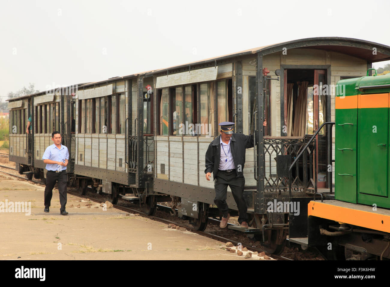 Retro train with wooden carriages on the station platform